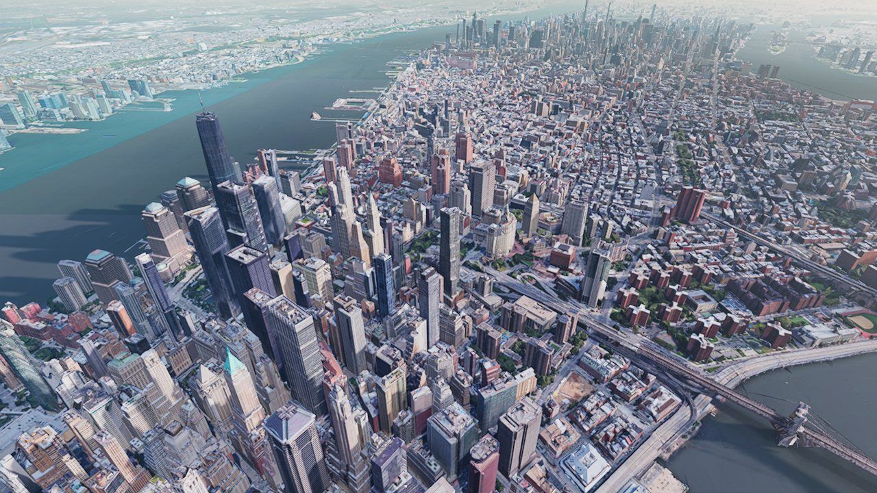 Lower Manhattan in early-morning light with long clipmap shadows across the blocks and river