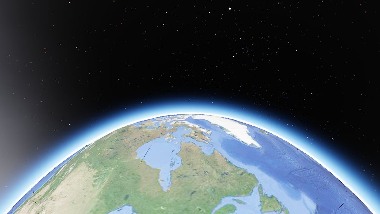 Earth from 3,000 km up, with a thin blue atmosphere at the limb and stars in black space.
